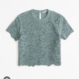 Abercrombie and Fitch crochet tee in size XS color is teal